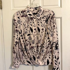 Flowered long sleeved blouse.